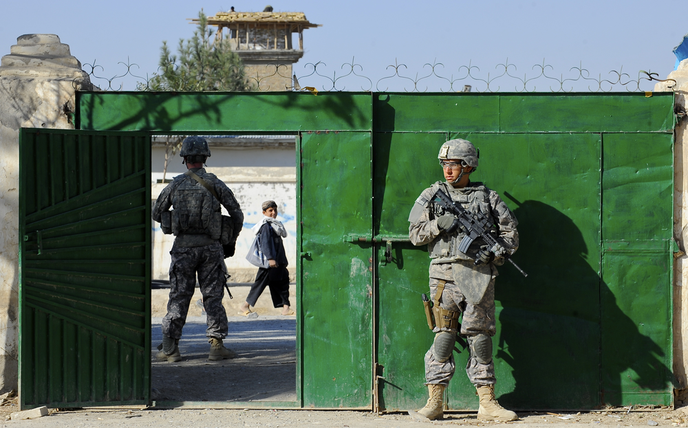 Military soldier with gun